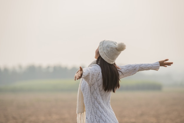 happy-woman-enjoying-idyllic-nature-celebrating-freedom-rising-her-arms_1150-7075.jpg